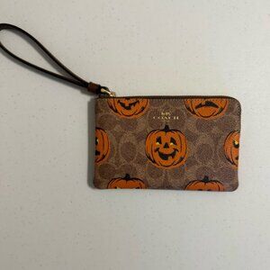 Coach Pumpkin Print Wristlet